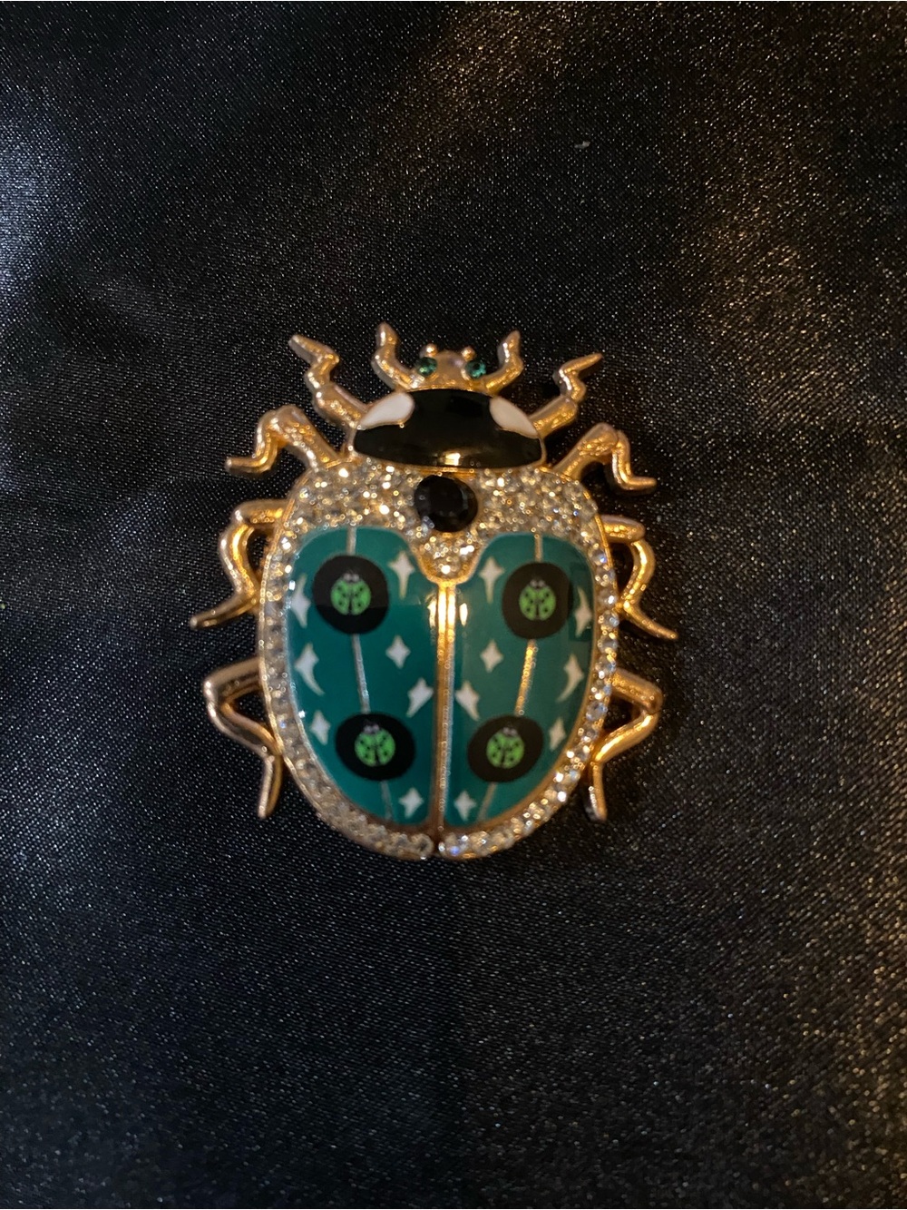 Gold-Tone Green Ladybug Brooch with Crystal Accents